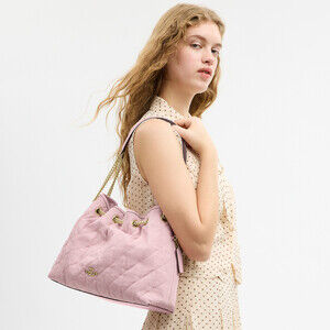 Coach Outlet Evelyn Shoulder Bag In Loved Denim With Quilting And Charm